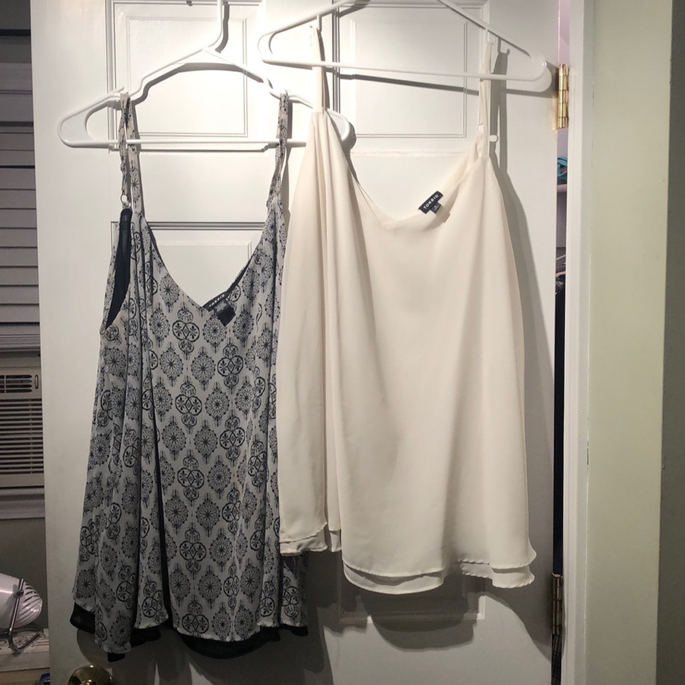 Torrid Two black and white sheer tank blouses